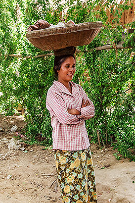 woman balancing load