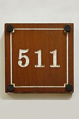apartment number sign